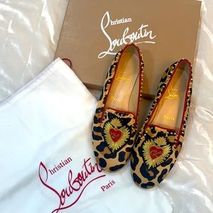 LOUBOUTIN excellent condition barely used leopard print w/gold spoke and red